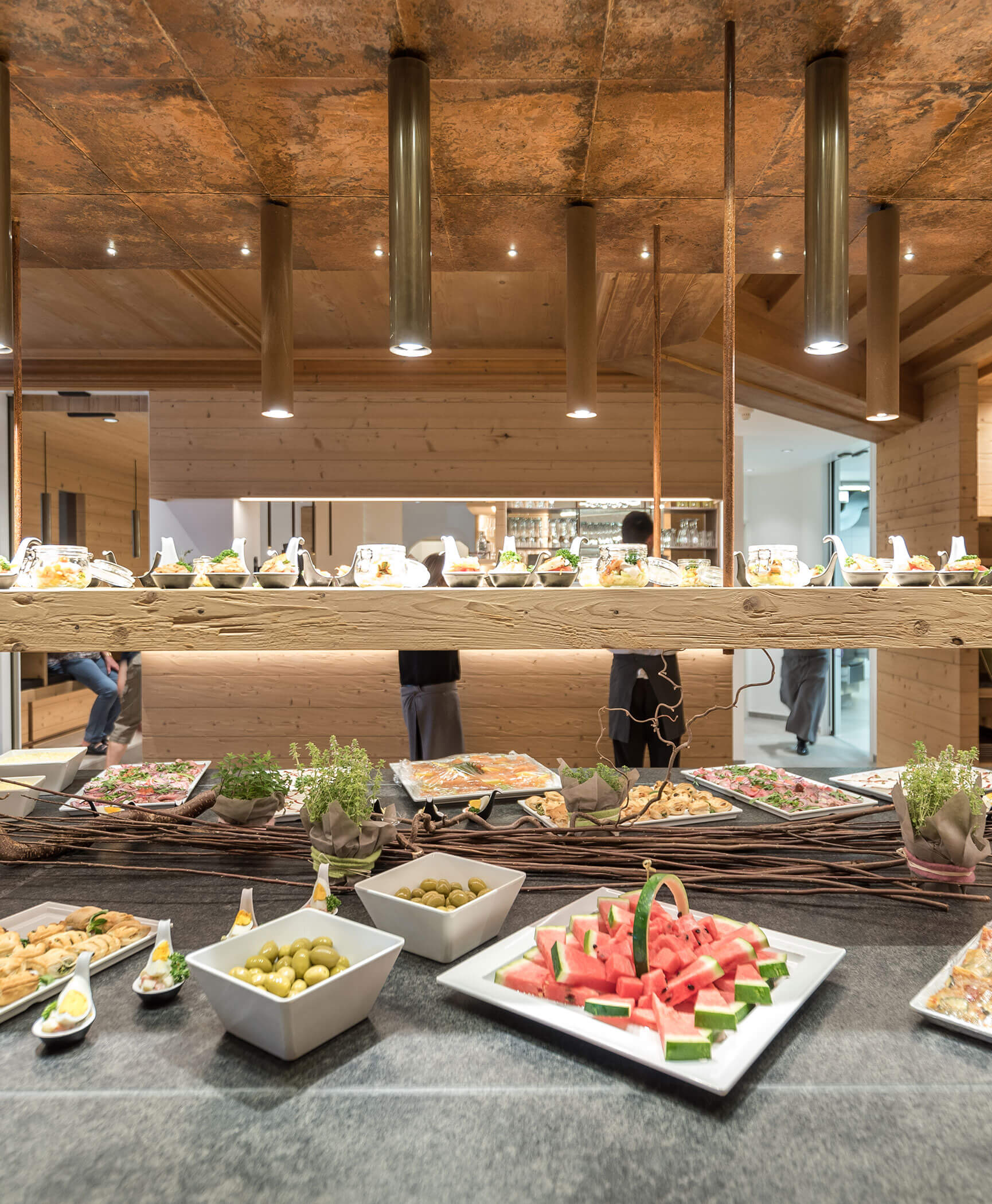 Buffet con meloni, olive e molto altro - Hotel Anewandter
