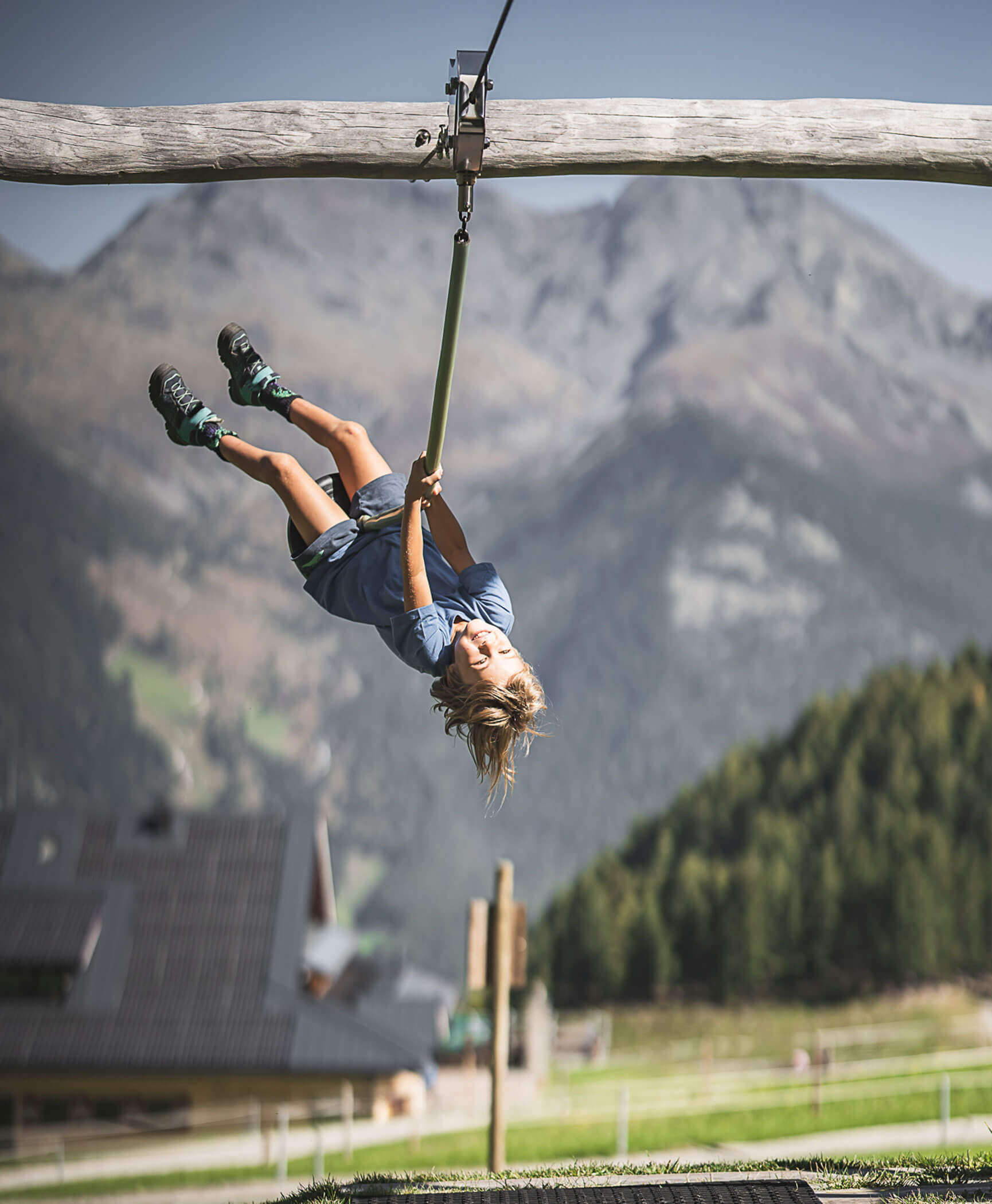 Un ragazzo sullo scivolo a piattello - Hotel Anewandter