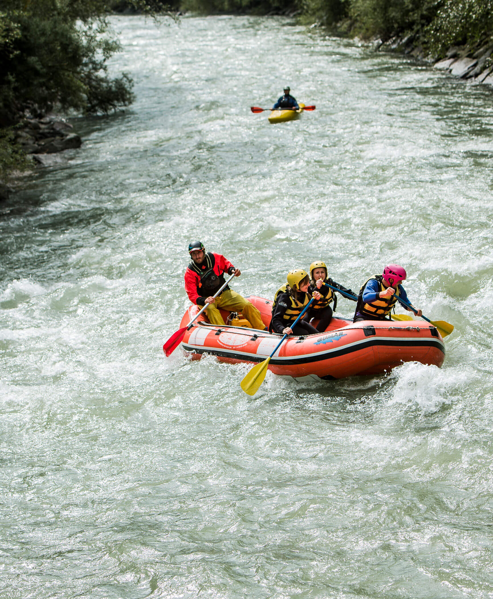 Four people rafting in a stream - Hotel Anewandter